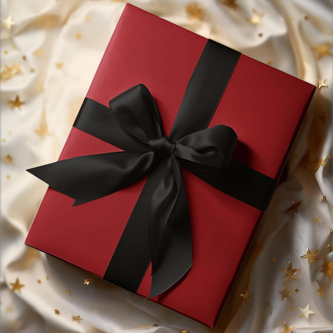 Edle Geschenverpackung mit schwarzer Schleife
